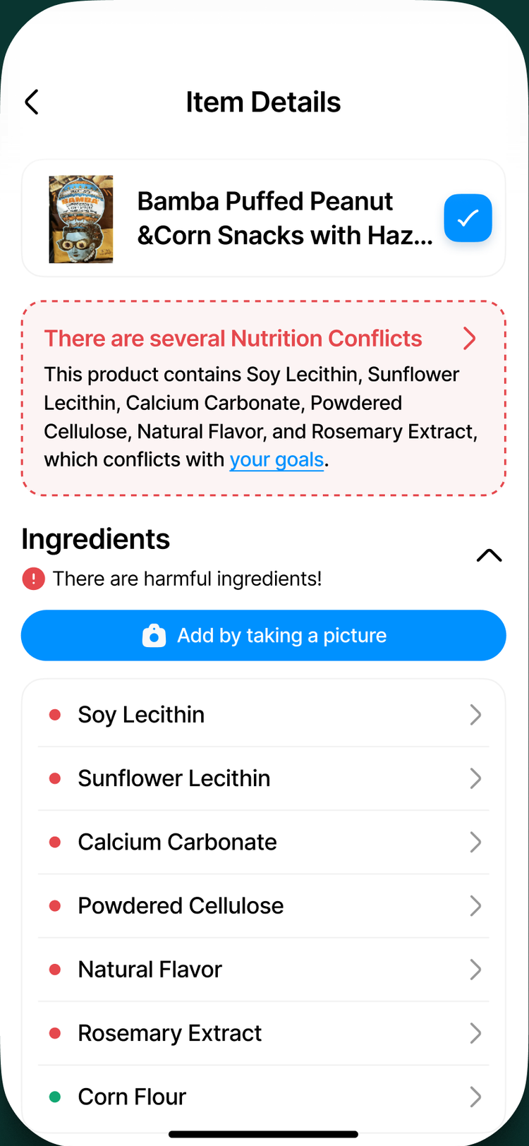 Item Details flagging a nutrition conflict and listing the exact ingredients that conflict with your goals, like soy lecithin and powdered cellulose